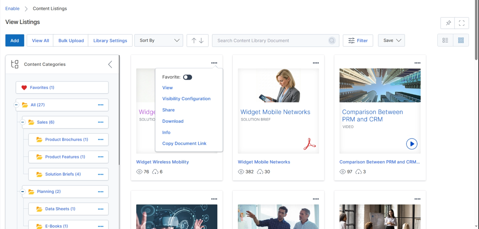 The Content Listings view within the Enable module serves as the central repository for all partner-facing marketing and sales assets, allowing vendors to manage and distribute various types of content to their partner ecosystem. This screen displays a catalog of available content items, which can include documents, videos, and other digital assets, organized by categories. Vendors utilize this interface to review content details, configure visibility settings for different partner types or tiers, and manage sharing or download options. The view supports different display modes, such as a detailed list view or a thumbnail grid, to facilitate easy browsing and management of the content library.